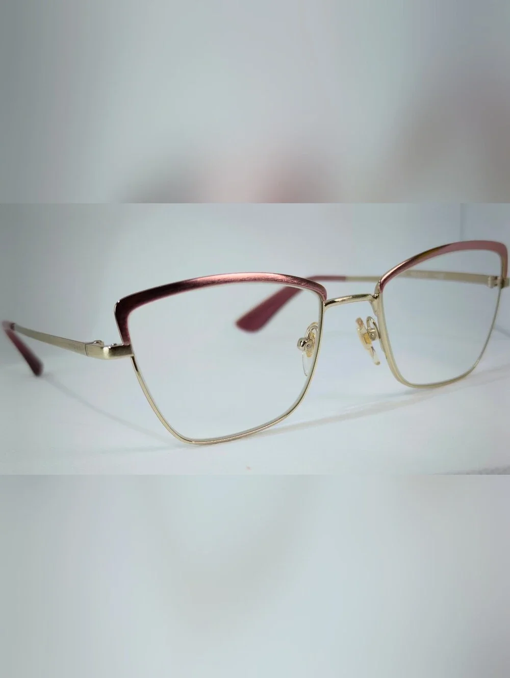 Vogue. Stylish Cat-Eye Metal Frame Glasses in Rose Gold Silk Texture.